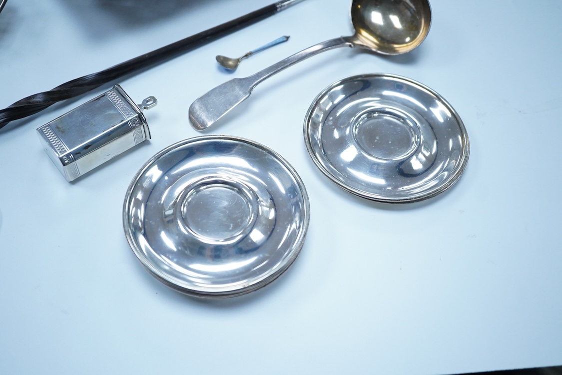 A small group of silver to include an Elizabeth II pierced shallow dish by Viners Ltd, Sheffield, 1957, diameter 12.4cm, a 1930's silver mounted cigarette box, a George III silver fiddle pattern sauce ladle and five silv